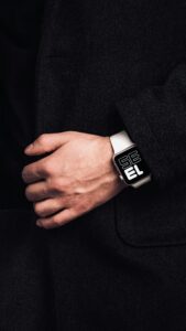 A stylish modern smartwatch worn on a wrist, perfect for tech and fashion enthusiasts.